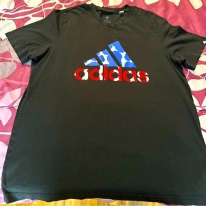 Adidas shirt with red white and blue symbol